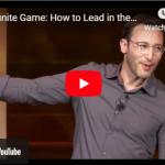 Speaker presenting "The Infinite Game" concept on leadership, gesturing on stage, captured in a YouTube video thumbnail.